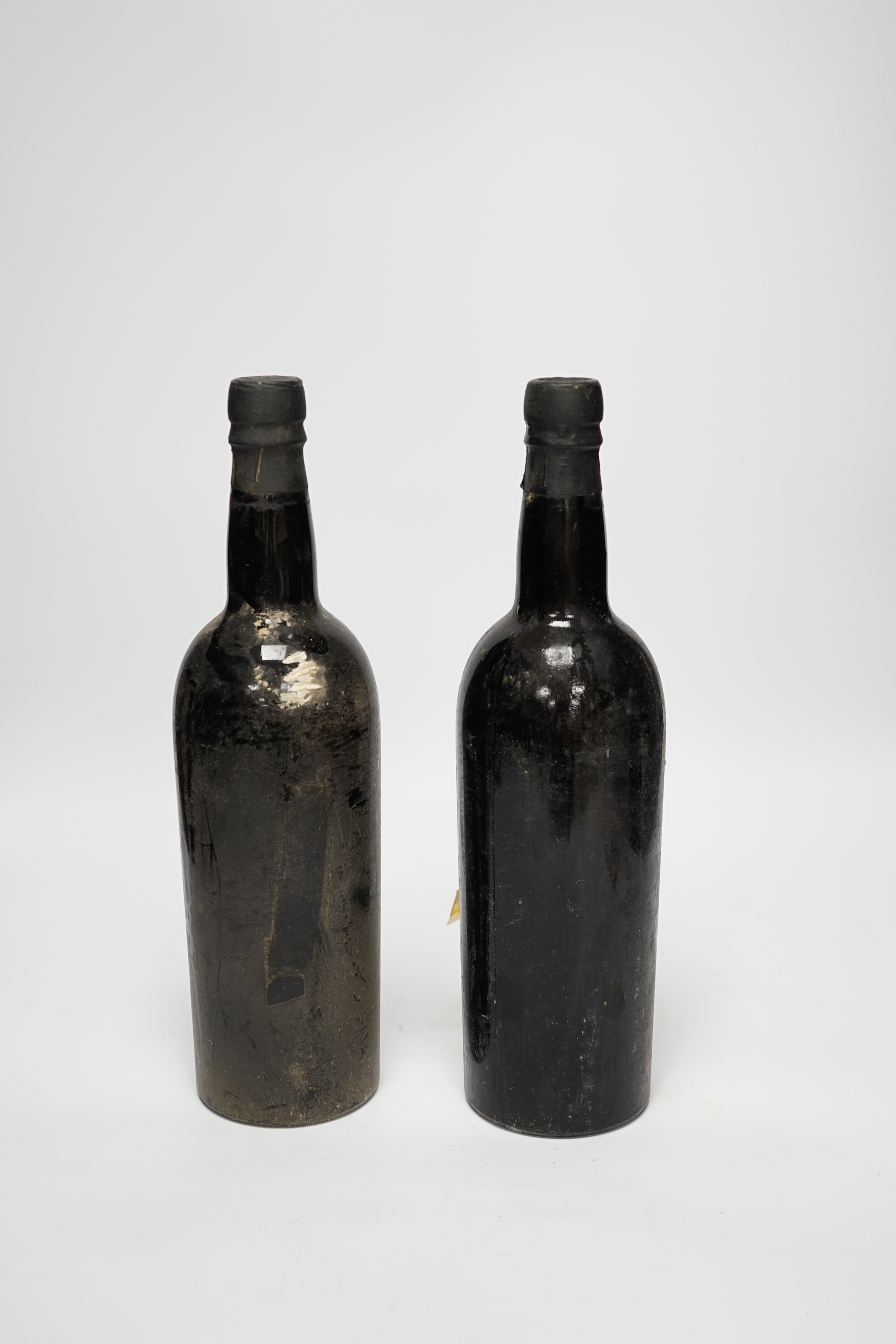 Two bottles of Sandeman Port Vintage 1960